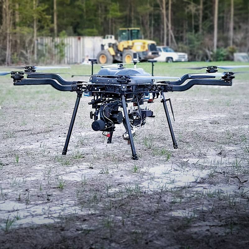 Survey aircraft staged on a project site